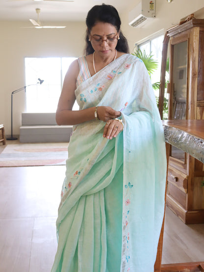 Nivedha - Ice Blue Linen Floral Embroidery Saree With Blouse Piece